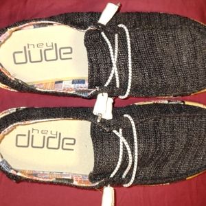 Hey Dude, women's size 11, black with multi color bottoms.